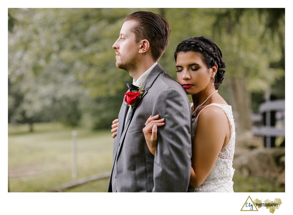 bride snuggling groom