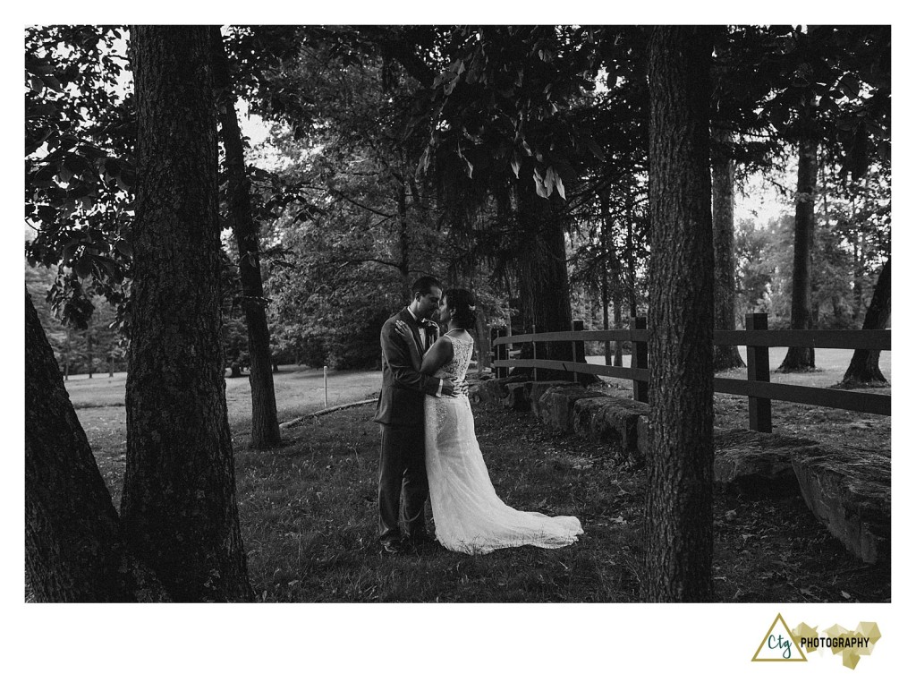 bride and groom in woods