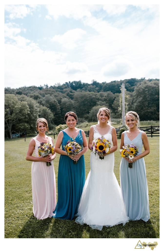 bridesmaids in a field
