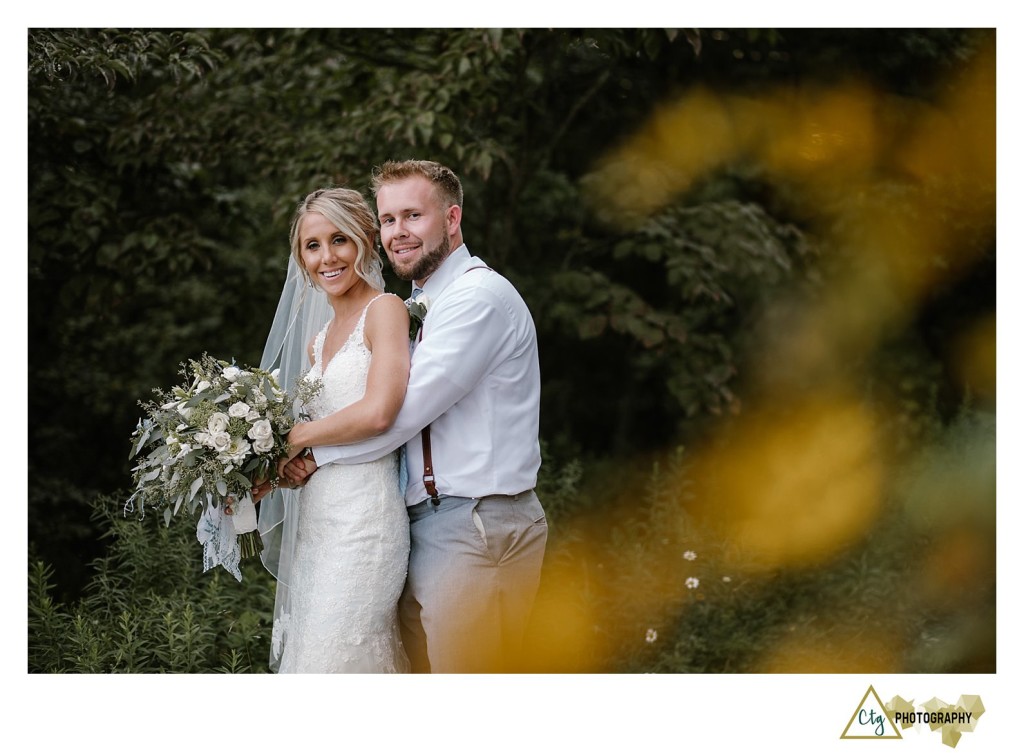 bride and groom at pittsburgh botanic garden