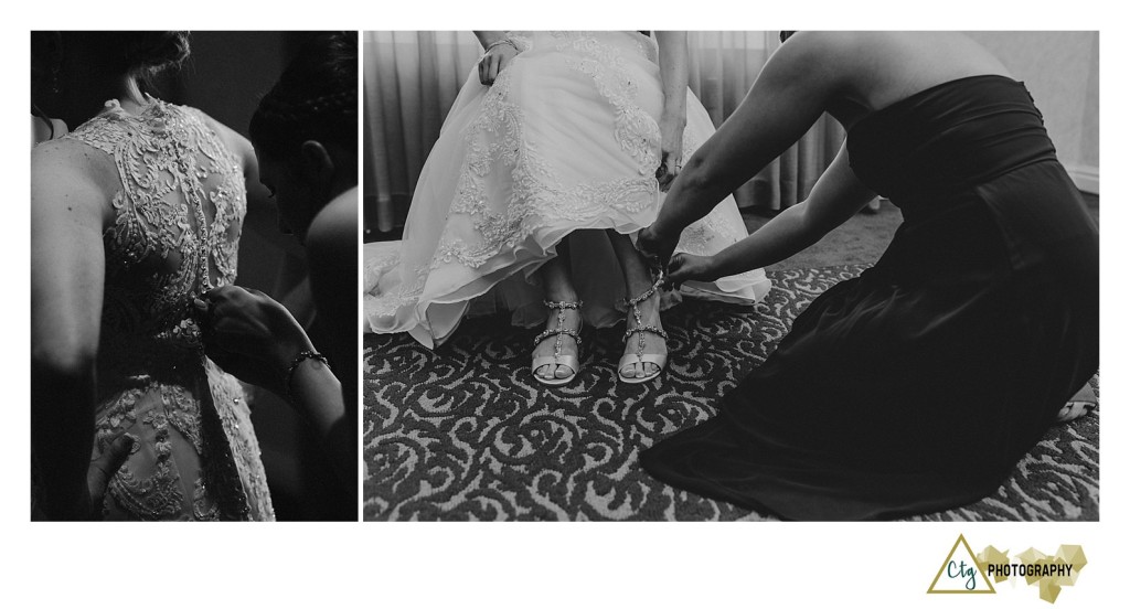 bride putting shoes on