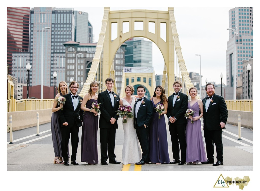 Bridal party on roberto clemente bridge