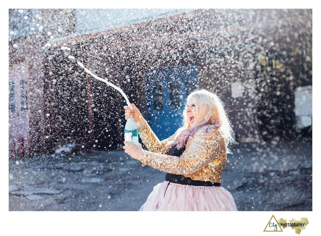 popping champagne on birthday