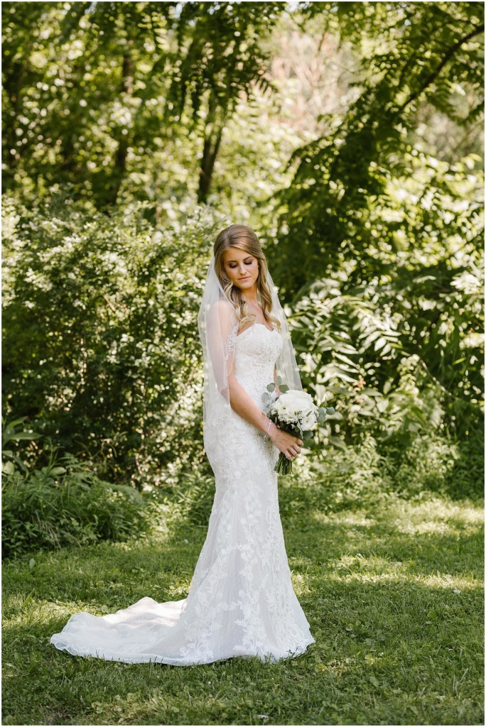 bride holding flowers