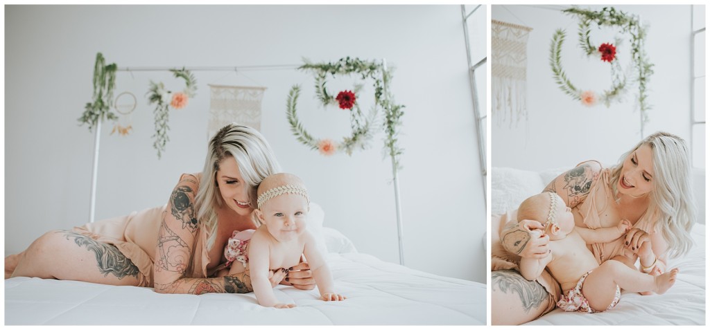mom with daughter on a bed