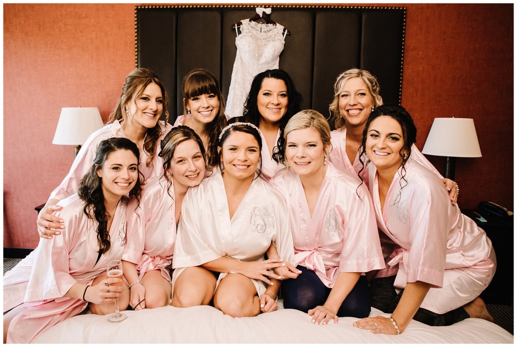 bridal party on a bed