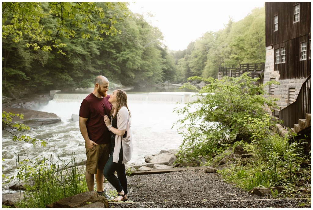 couple by mcconnells mill covered bridge