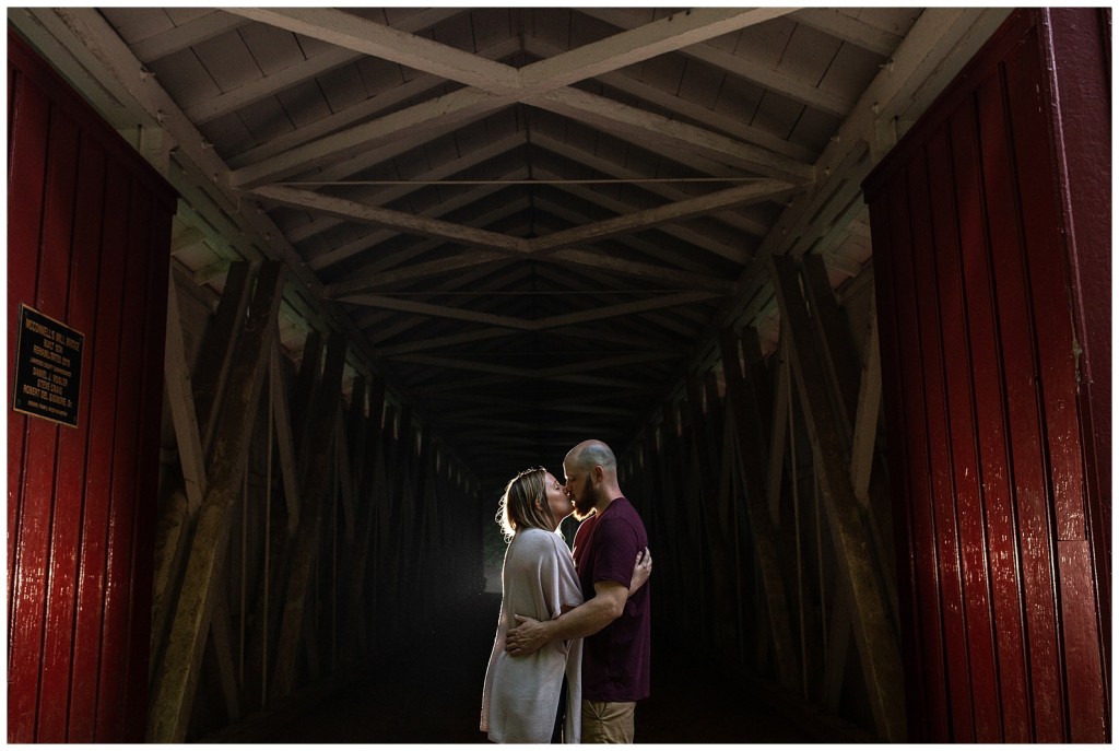 couple by mcconnells mill covered bridge