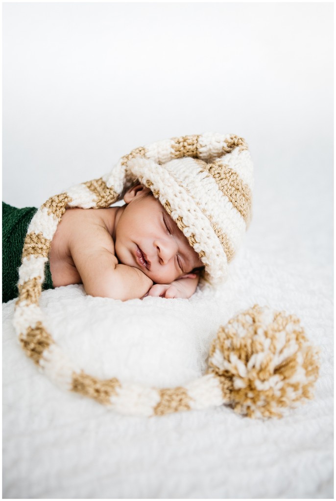 newborn with large hat