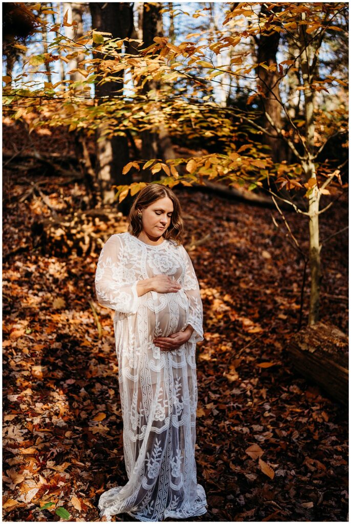 Maternity photos with fall leaves
