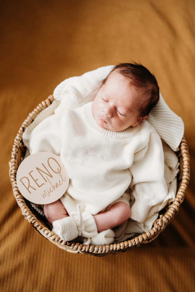 newborn in a basket