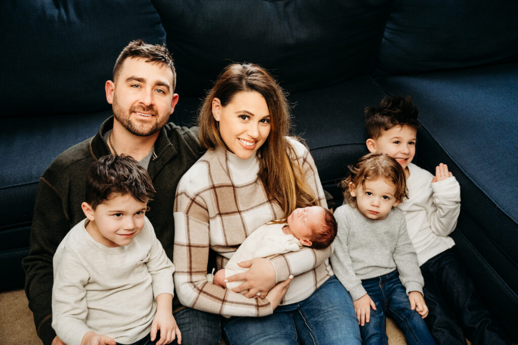 newborn baby with family