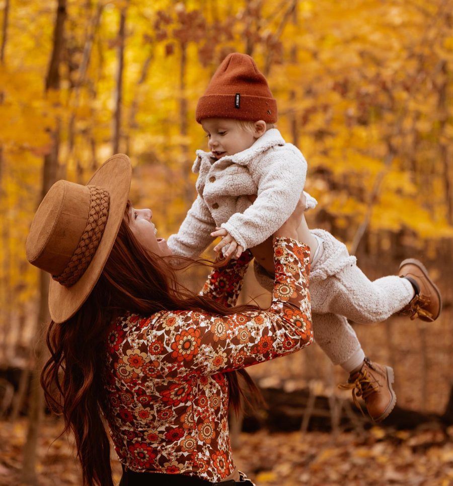 woman holding toddler